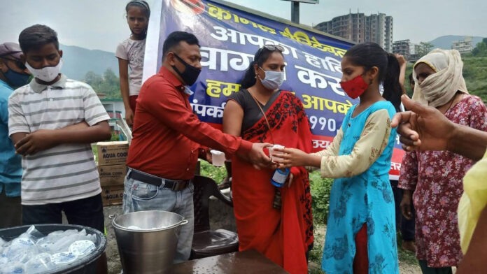 Komal Charitable Trust distributed juice and water