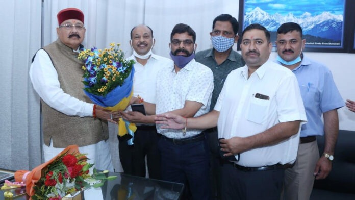 Delegation of GMVN Managers Association met Satpal Maharaj