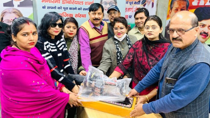 Distributed sewing machines to women Master trainer