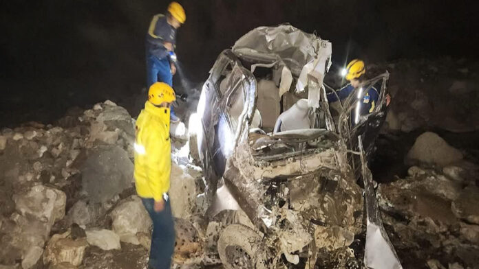 Two people died after their car fell into a ditch