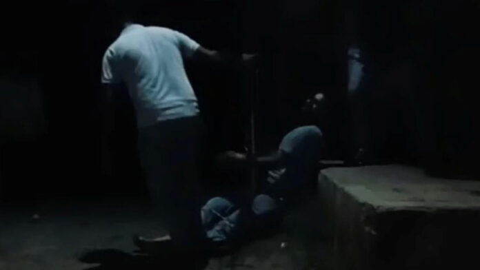 The youth was tied to a pole and beaten up